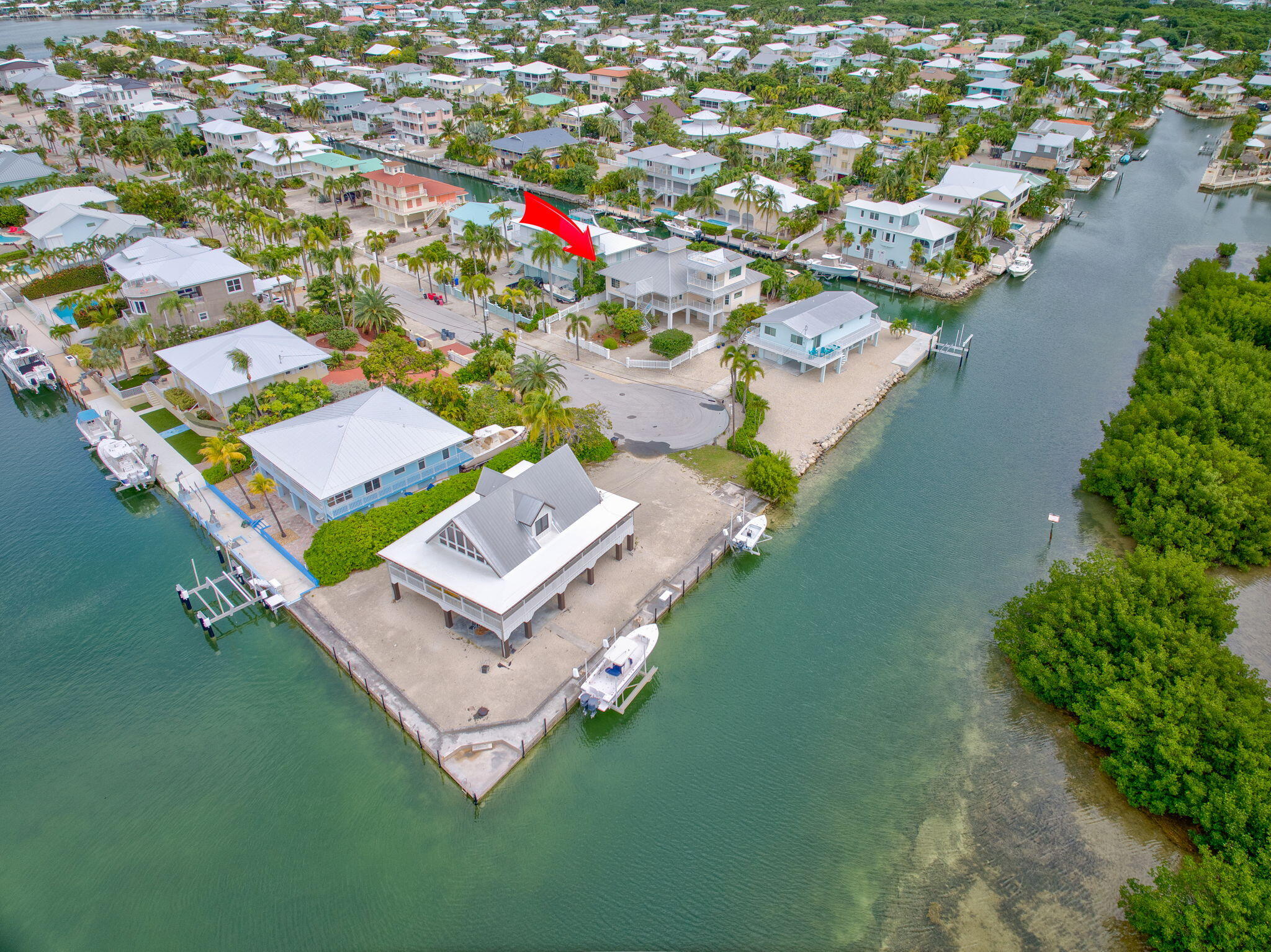 1147 Flagship Drive Summerland Key, FL 33042 - Photo 49 of 53 an aerial view of a house with a garden