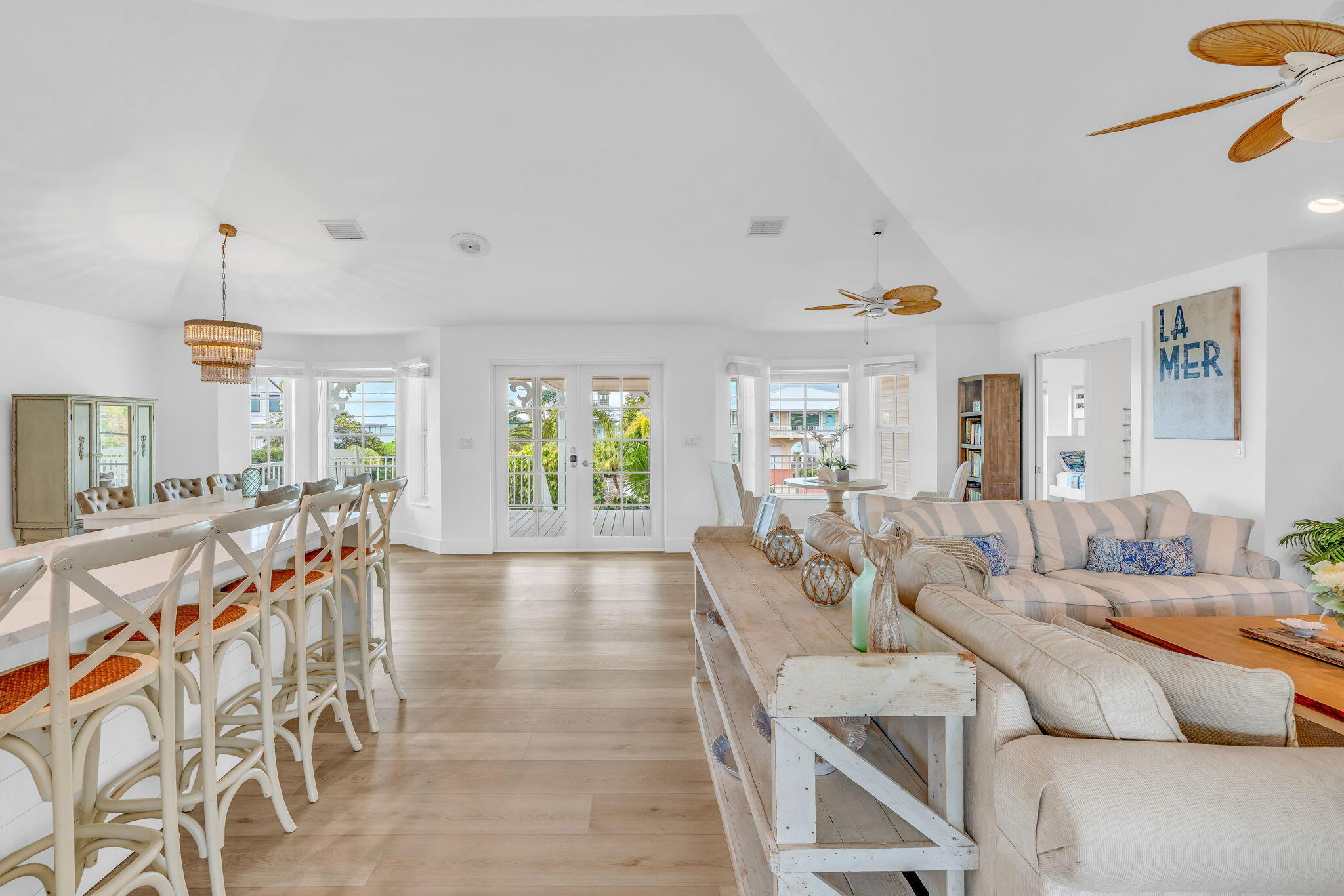 1147 Flagship Drive Summerland Key, FL 33042 - Photo 6 of 53 a living room with furniture and a wooden floor