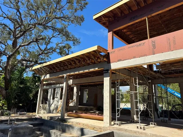 a view of a building with a tree