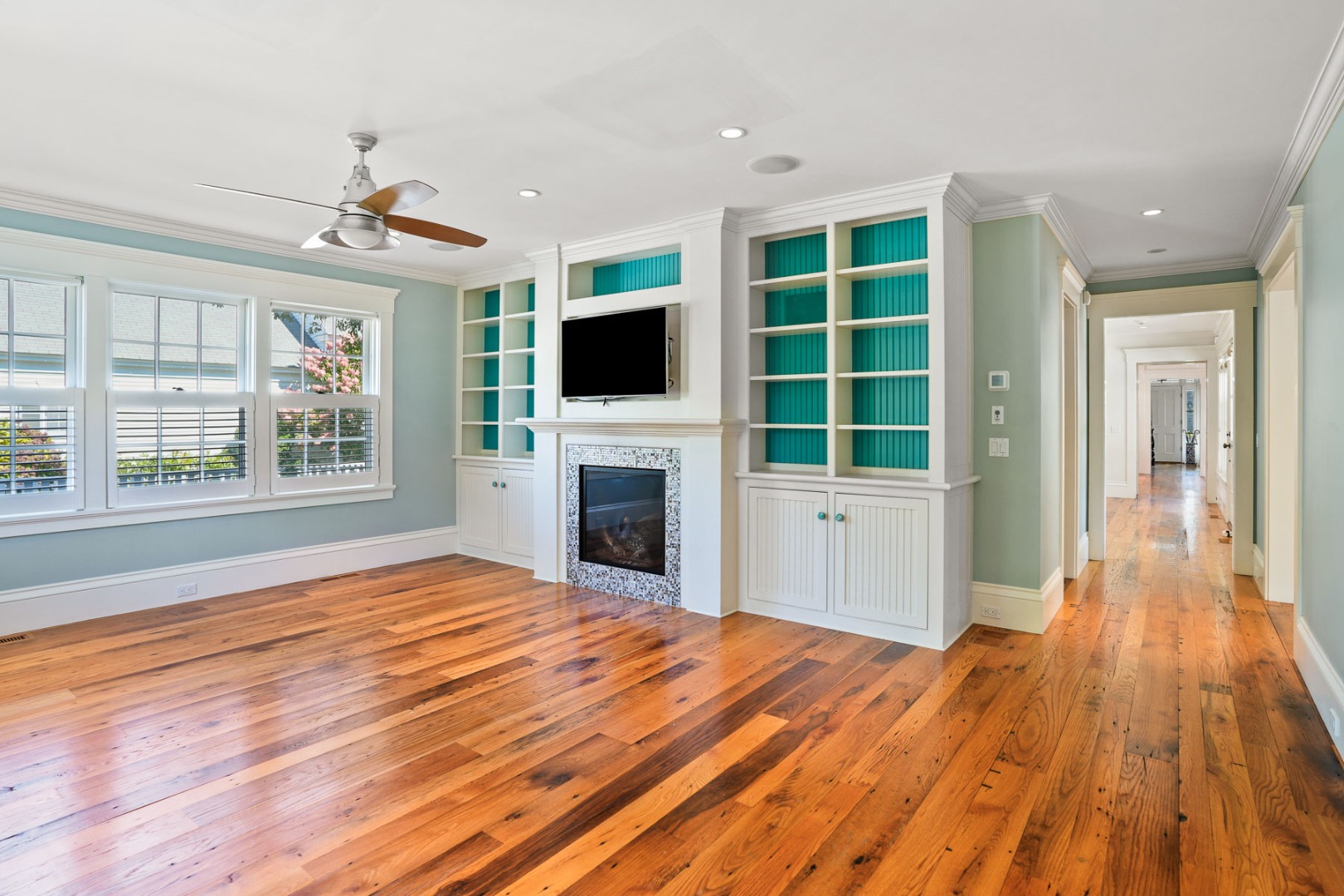 52 South Summer Street Edgartown, MA 02539 - Photo 19 of 51 a view of a livingroom with wooden floor and a fireplace