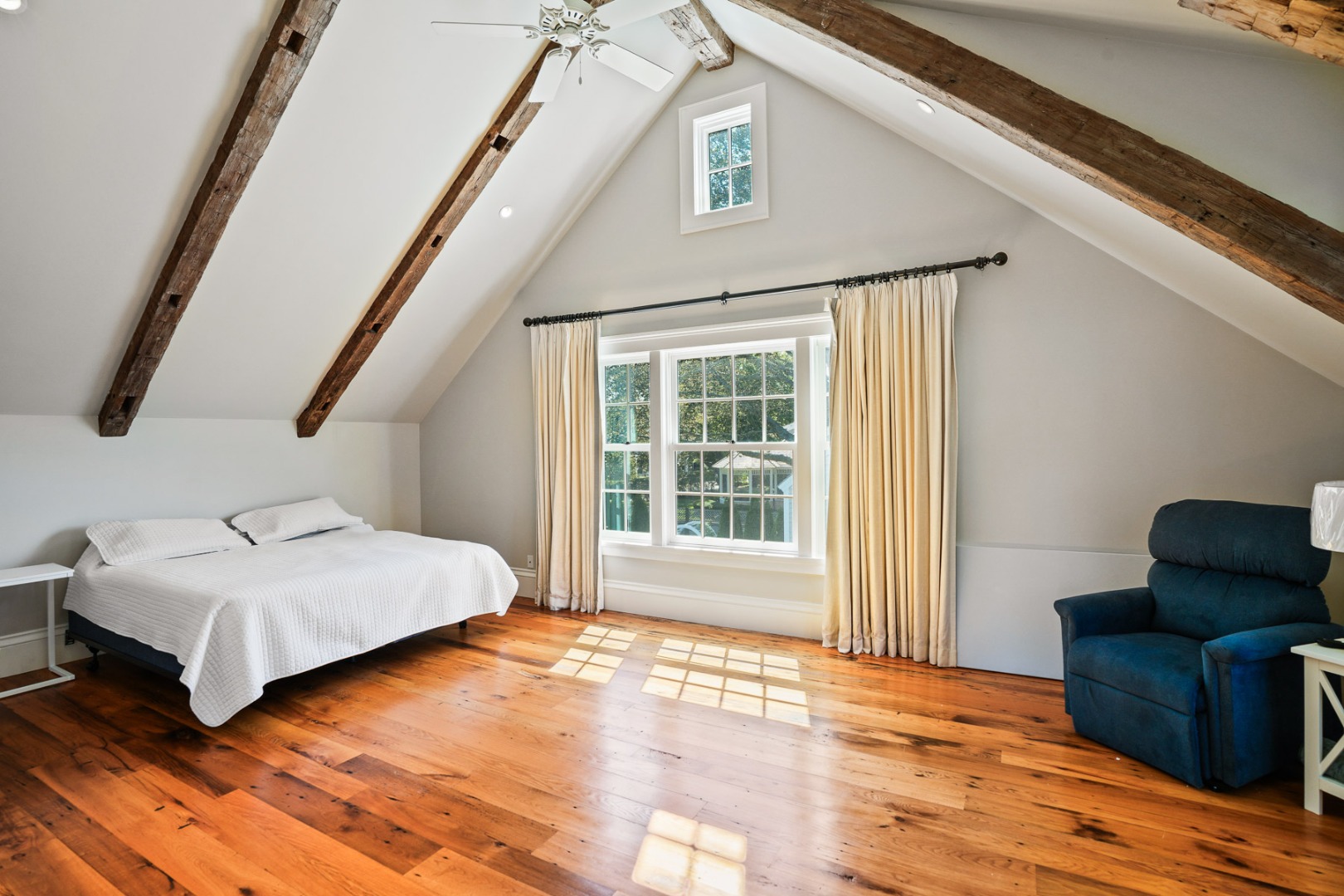 52 South Summer Street Edgartown, MA 02539 - Photo 23 of 51 a bedroom with a bed and wooden floor