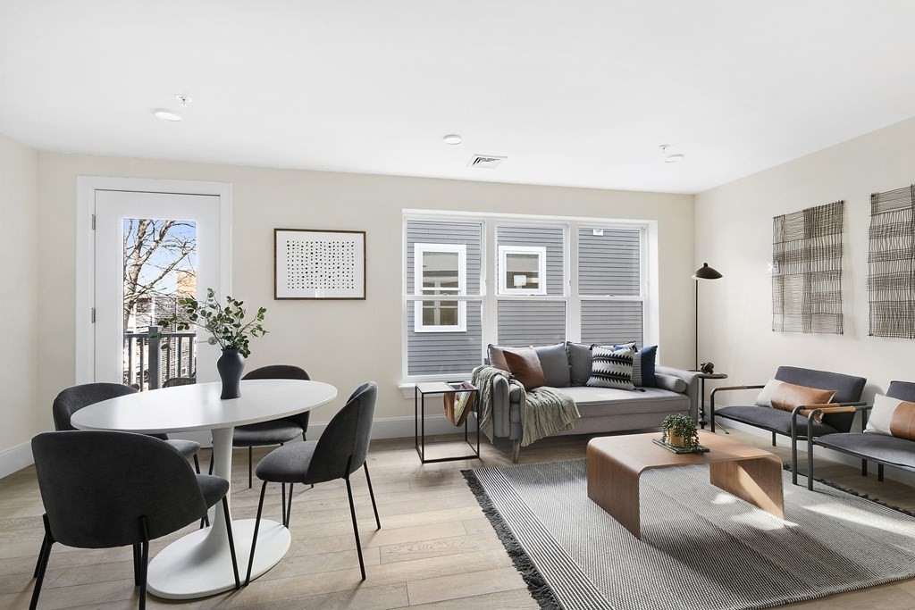 29 Ward Street, Unit 101 Boston, MA 02127 - Photo 4 of 11 a living room with furniture and a potted plant