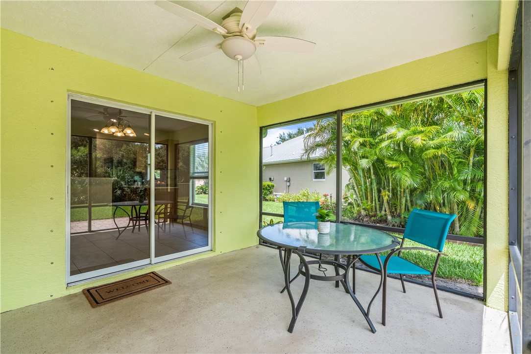 1087 4th Lane Southwest Vero Beach, FL 32962 - Photo 18 of 34 a dining room with furniture and a window