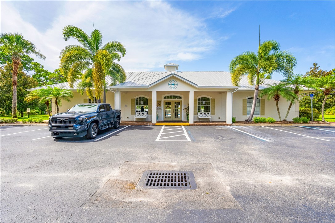 1087 4th Lane Southwest Vero Beach, FL 32962 - Photo 29 of 34 a view of multiple houses with a yard