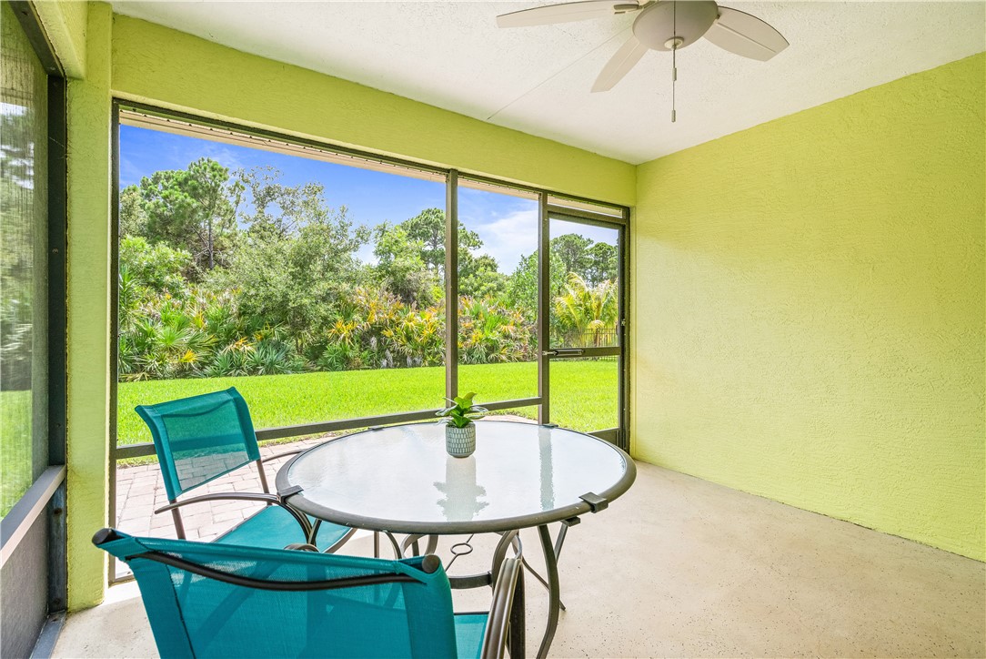 1087 4th Lane Southwest Vero Beach, FL 32962 - Photo 6 of 34 a view of a dining room with furniture and a window