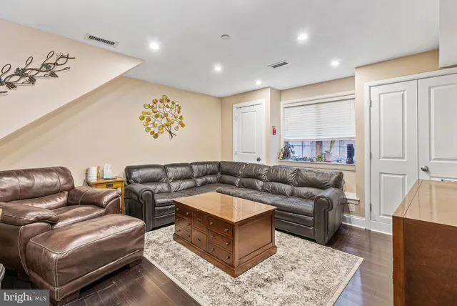 a living room with furniture and a couch