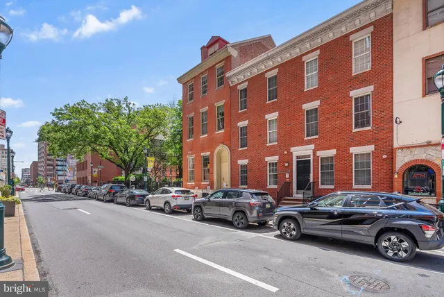 a car parked in front of a building