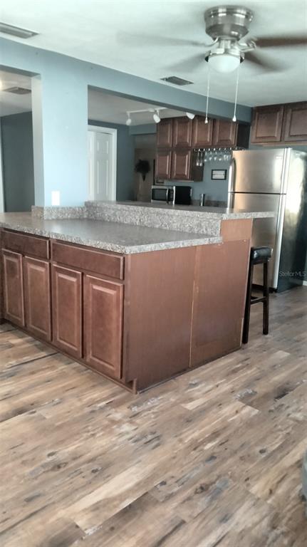 5245 Bluejay Drive Holiday, FL 34690 - Photo 7 of 18 a view of kitchen and sink