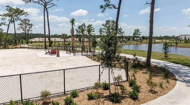 a view of a swimming pool with a patio