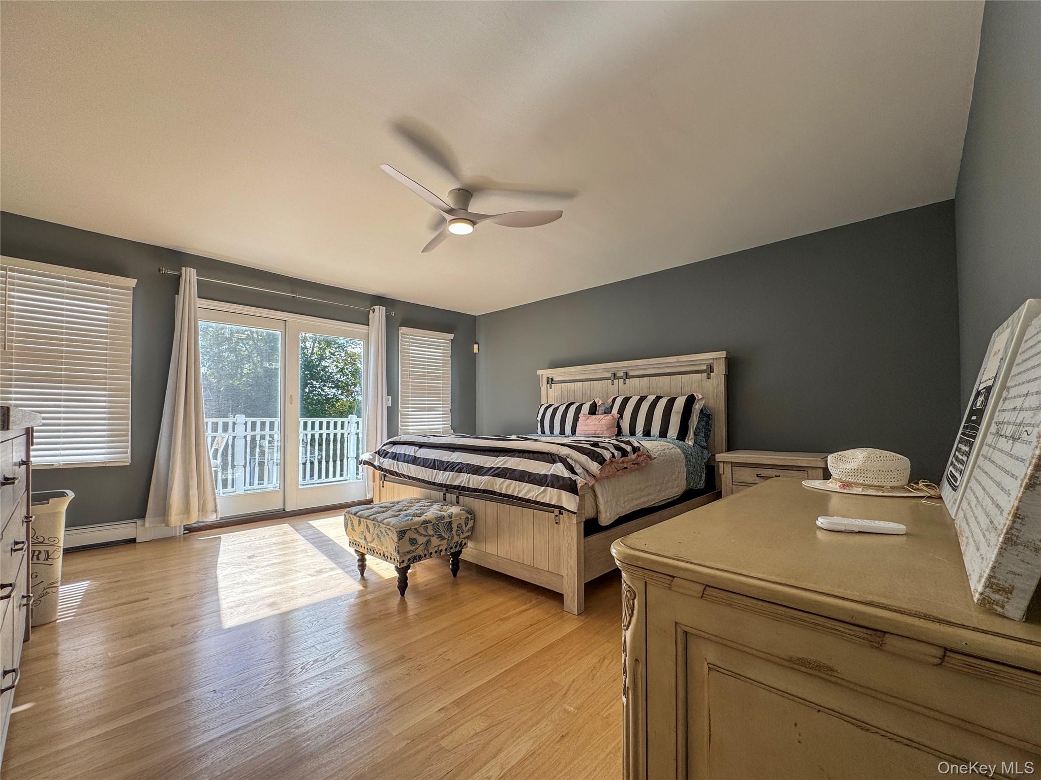 137 South Road Westhampton, NY 11977 - Photo 20 of 43 a bedroom with furniture and a window