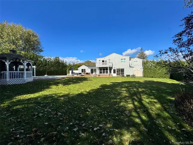 a view of a house with a big yard