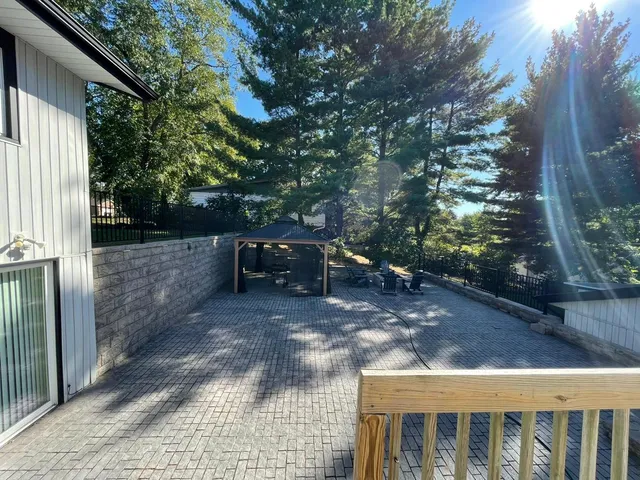 a view of backyard with seating space