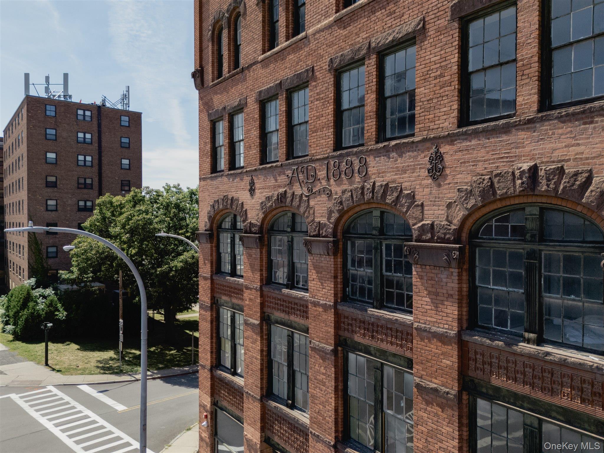 155 River Street, Unit BASEMENT C Troy, NY 12180 - Photo 12 of 22 a front view of a building with street view