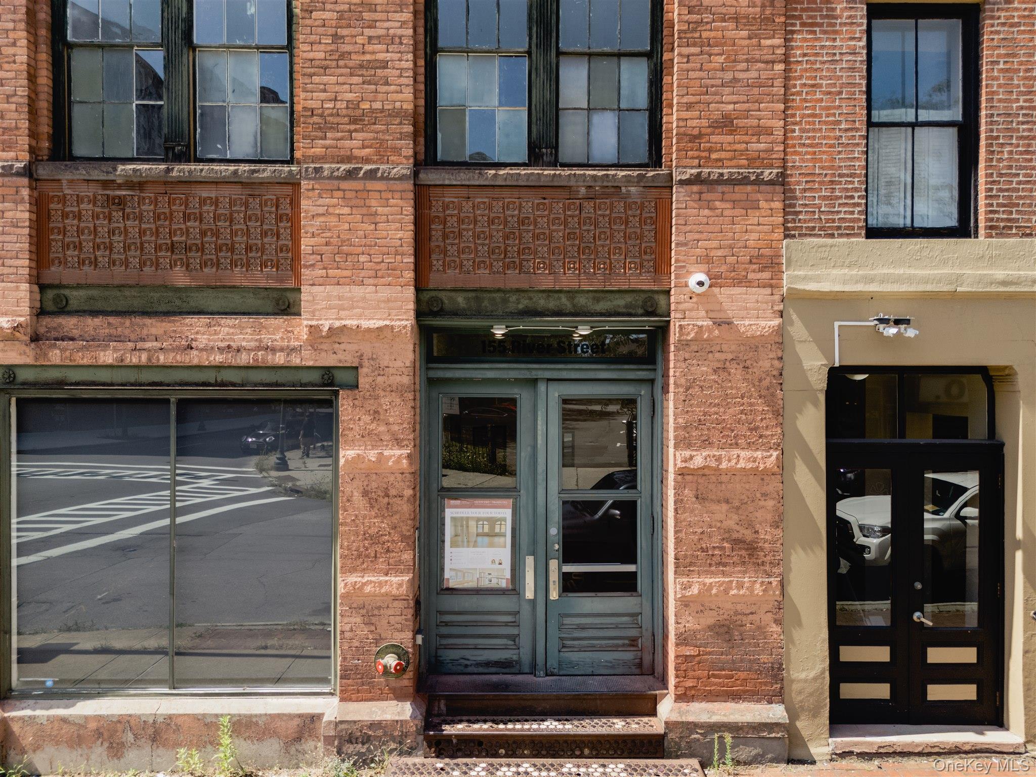 155 River Street, Unit BASEMENT C Troy, NY 12180 - Photo 17 of 22 a building with a door and a window