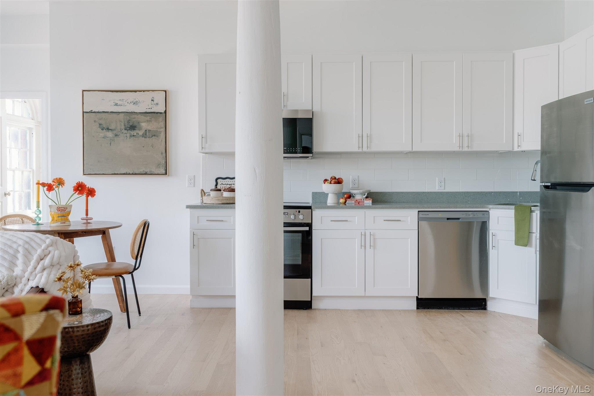155 River Street, Unit BASEMENT C Troy, NY 12180 - Photo 6 of 22 a view of kitchen with furniture and wooden floor