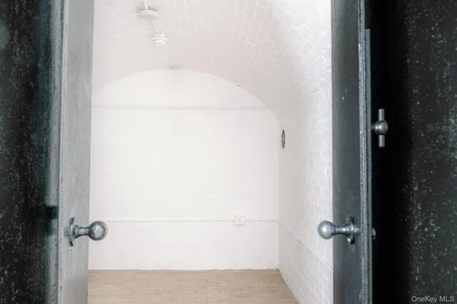 an aerial view of a house with a lake view