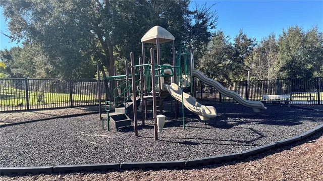 a view of a park with slide