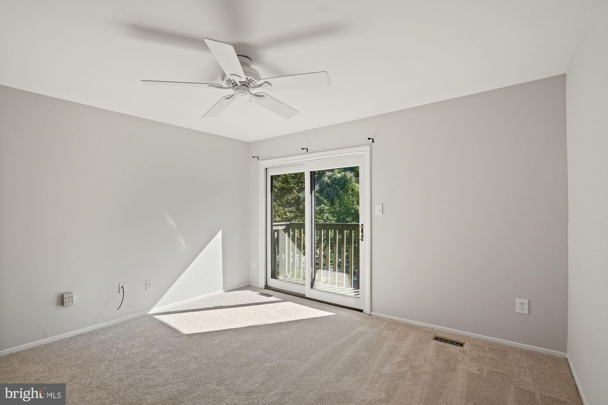 2050 Winged Foot Court Reston, VA 20191 - Photo 12 of 32 Master Bedroom with Balcony