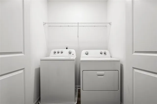 a utility room with dryer and washer