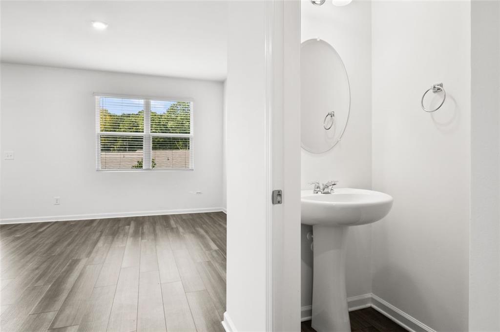 2615 Senegal Way, Unit 2615 Atlanta, GA 30331 - Photo 10 of 20 a bathroom with a sink and mirror
