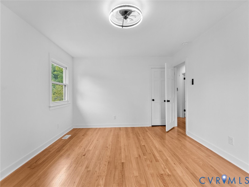 7361 Creek Ridge Road Henrico, VA 23231 - Photo 34 of 51 Hardwood flooring, white walls, double-hung window