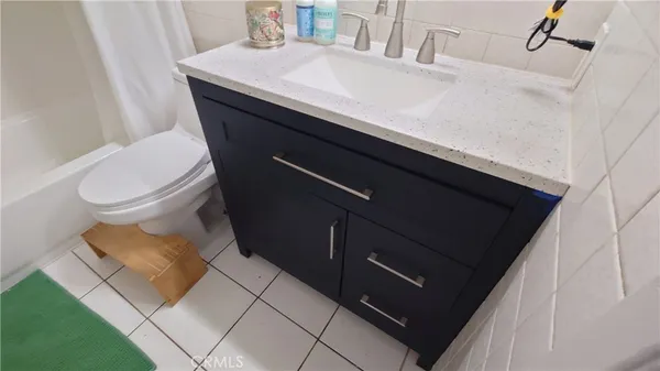 a bathroom with a sink and a toilet