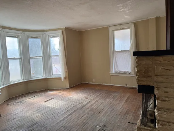 a living room with a fireplace
