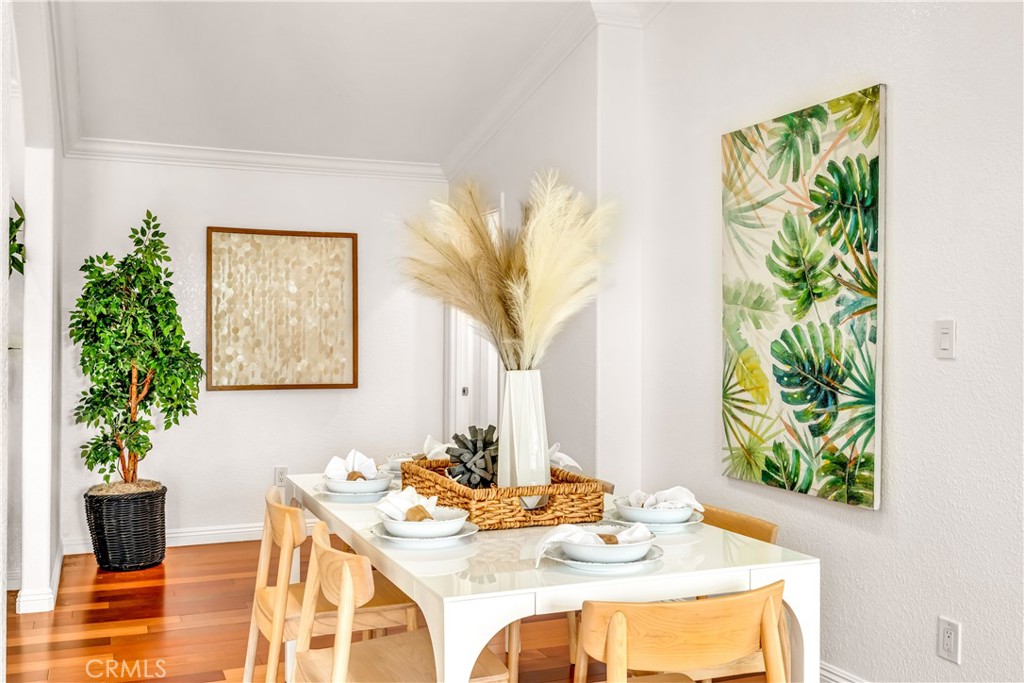 1724 El Rey Road San Pedro, CA 90732 - Photo 17 of 51 a dining room with furniture and a potted plant