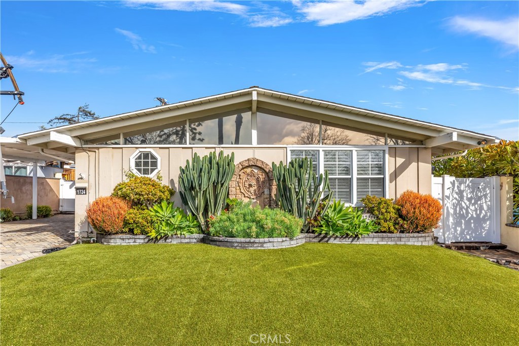 1724 El Rey Road San Pedro, CA 90732 - Photo 2 of 51 a front view of a house with garden