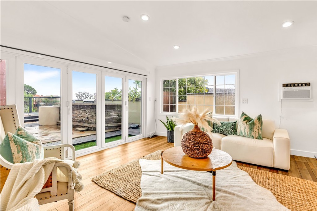 1724 El Rey Road San Pedro, CA 90732 - Photo 21 of 51 a living room with furniture large windows and wooden floor