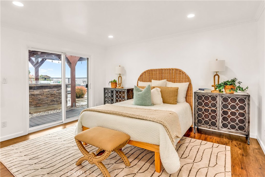 1724 El Rey Road San Pedro, CA 90732 - Photo 27 of 51 a bedroom with a bed and wooden floor