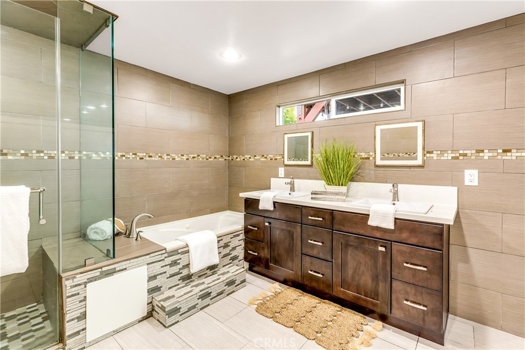 1724 El Rey Road San Pedro, CA 90732 - Photo 30 of 51 a bathroom with a tub sink and mirror