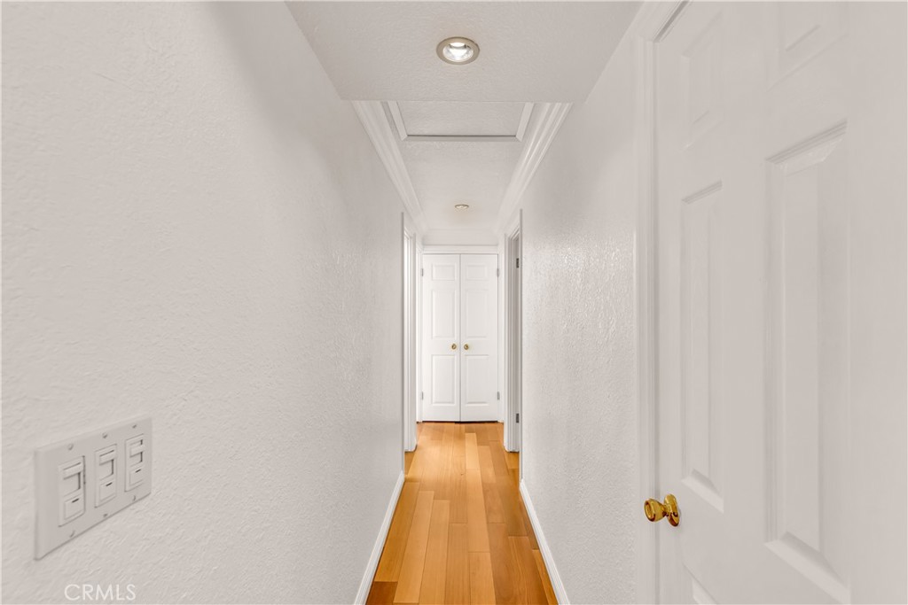 1724 El Rey Road San Pedro, CA 90732 - Photo 32 of 51 a view of a hallway with wooden floor and staircase
