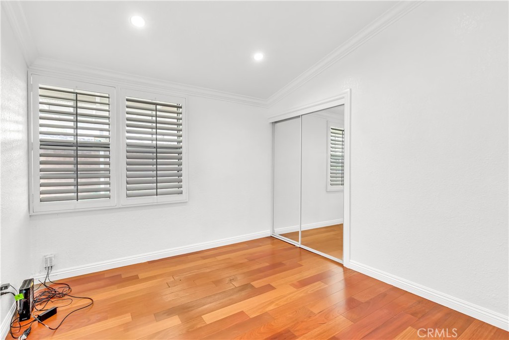 1724 El Rey Road San Pedro, CA 90732 - Photo 33 of 51 a view of empty room with wooden floor and fan