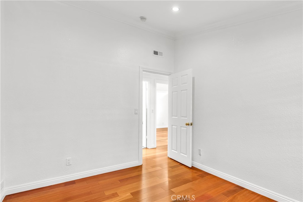 1724 El Rey Road San Pedro, CA 90732 - Photo 34 of 51 a view of an empty room with wooden floor