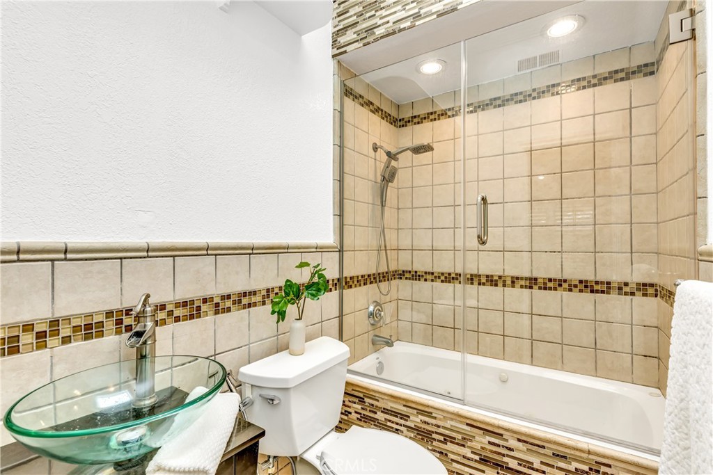 1724 El Rey Road San Pedro, CA 90732 - Photo 35 of 51 a bathroom with a bathtub and a shower