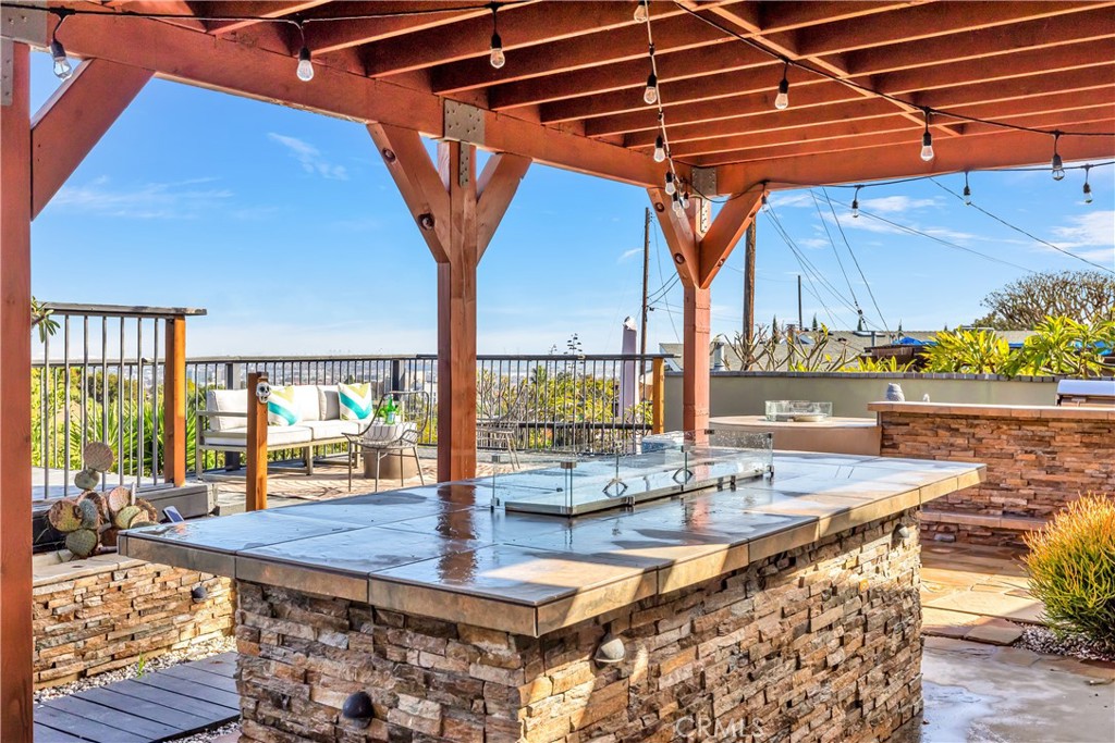 1724 El Rey Road San Pedro, CA 90732 - Photo 49 of 51 a view of a patio with a table and chairs