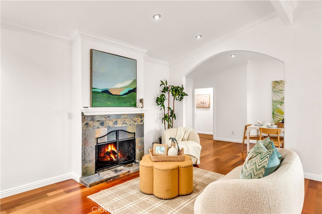 1724 El Rey Road San Pedro, CA 90732 - Photo 7 of 51 a living room with furniture and a fireplace