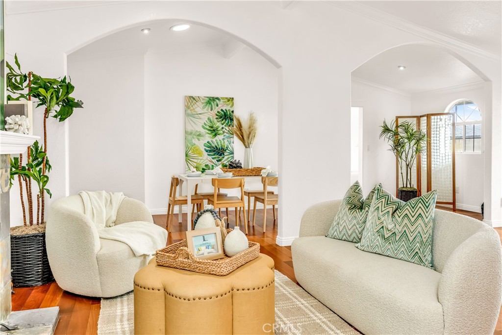1724 El Rey Road San Pedro, CA 90732 - Photo 8 of 51 a living room with furniture and a potted plant
