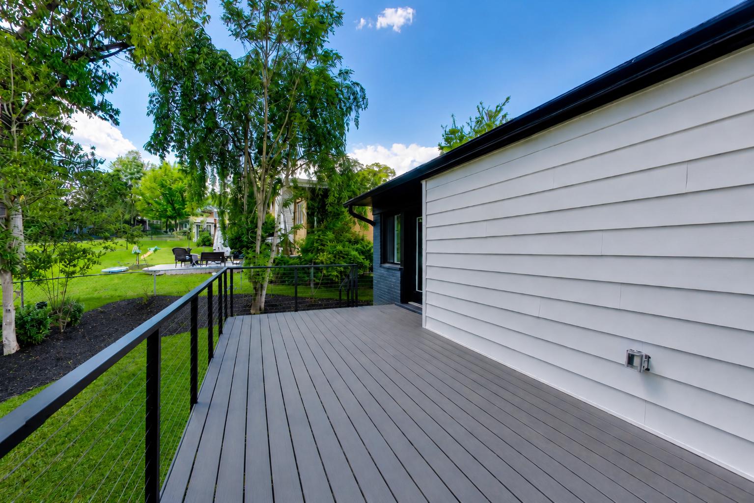 810 Malta Lane Silver Spring, MD 20901 - Photo 33 of 35 Serene deck with cable railing & lush green views.