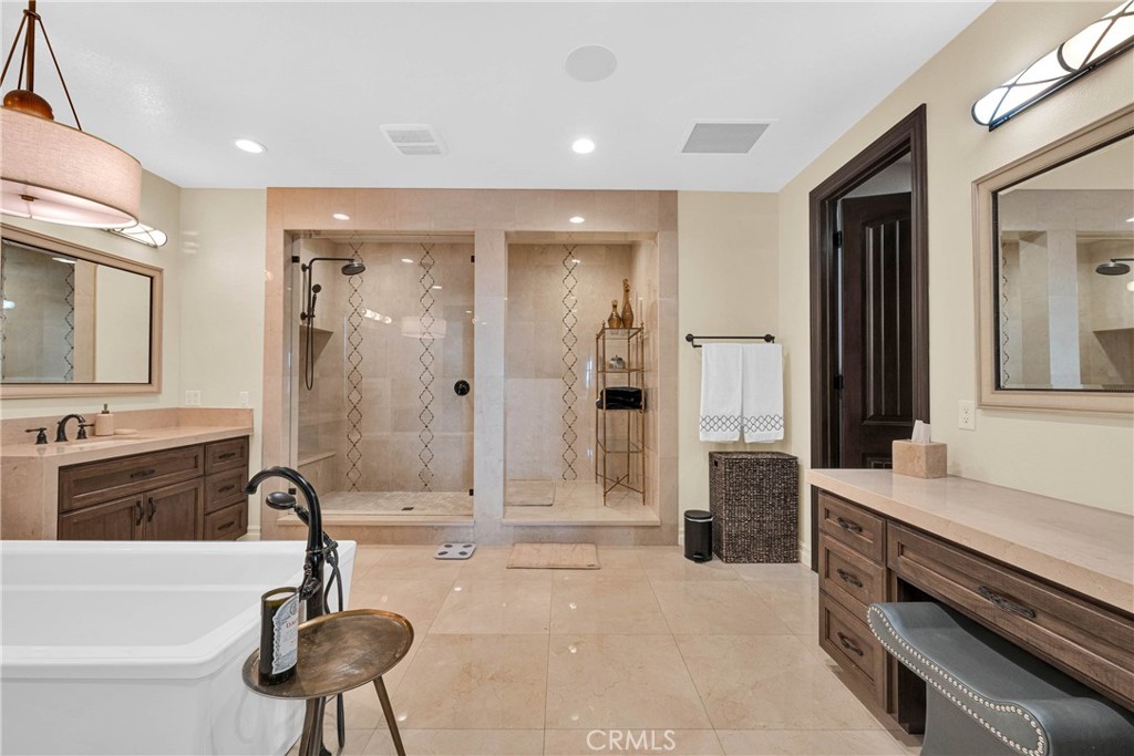 16727 Pienza Court Riverside, CA 92503 - Photo 30 of 41 The spa shower spans nearly the full width of the room