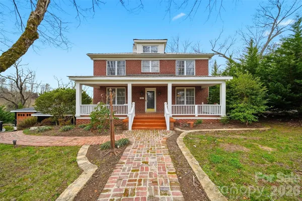 a house view with a garden space