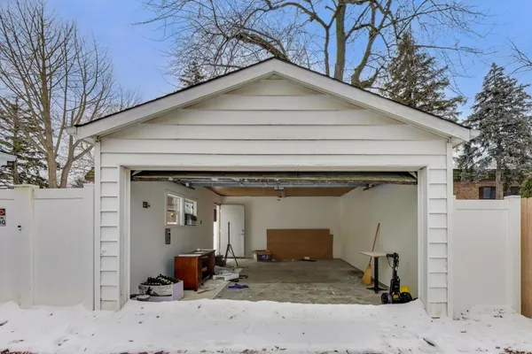 a picture of a very nice looking living room with a white refrigerator