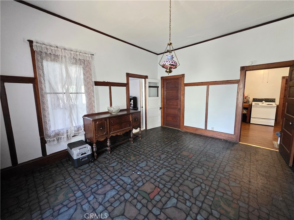 1414 Marin Street Corning, CA 96021 - Photo 9 of 43 a room with furniture and a window
