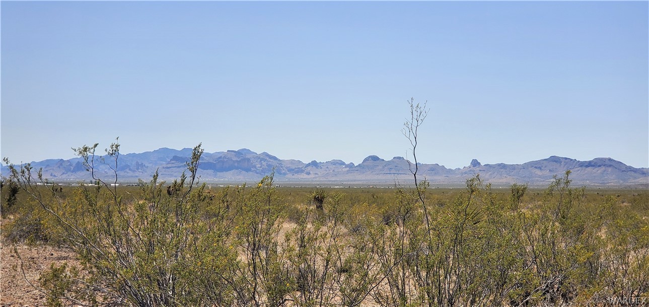 0 North Drake Road Golden Valley, AZ 86413 - Photo 9 of 10 a view of a town with mountains in the background