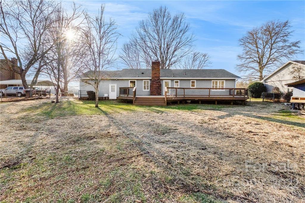 13809 Mayes Road Huntersville, NC 28078 - Photo 5 of 15 a view of a house with a yard covered in snow