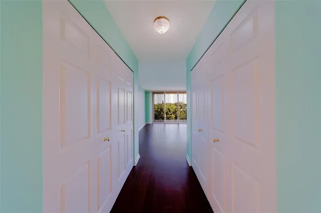 a bathroom with a double vanity sink and mirror