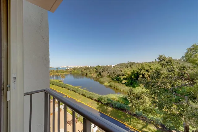 a view of a house with outdoor space and sitting area