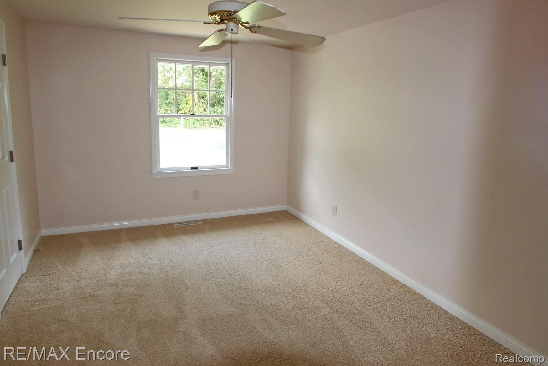 4210 Orion Road Rochester, MI 48306 - Photo 23 of 27 One of four bedroom, this junior suite walks out to the upper balcony and has a full private bath.