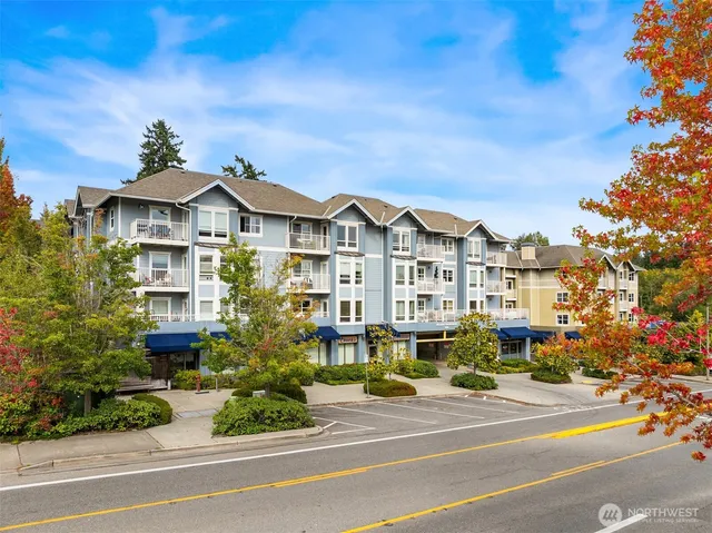 a view of a building with a garden and plants